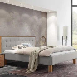 Graues Polster Bett Typon