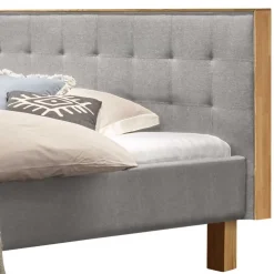 Graues Polster Bett Typon